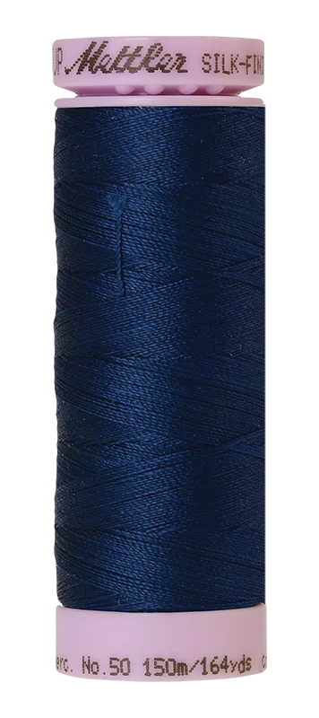 Navy Mettler silk finish egyptian cotton 50WT (164 yd) thread spool. 9105-0825 alternate: 10550-0916